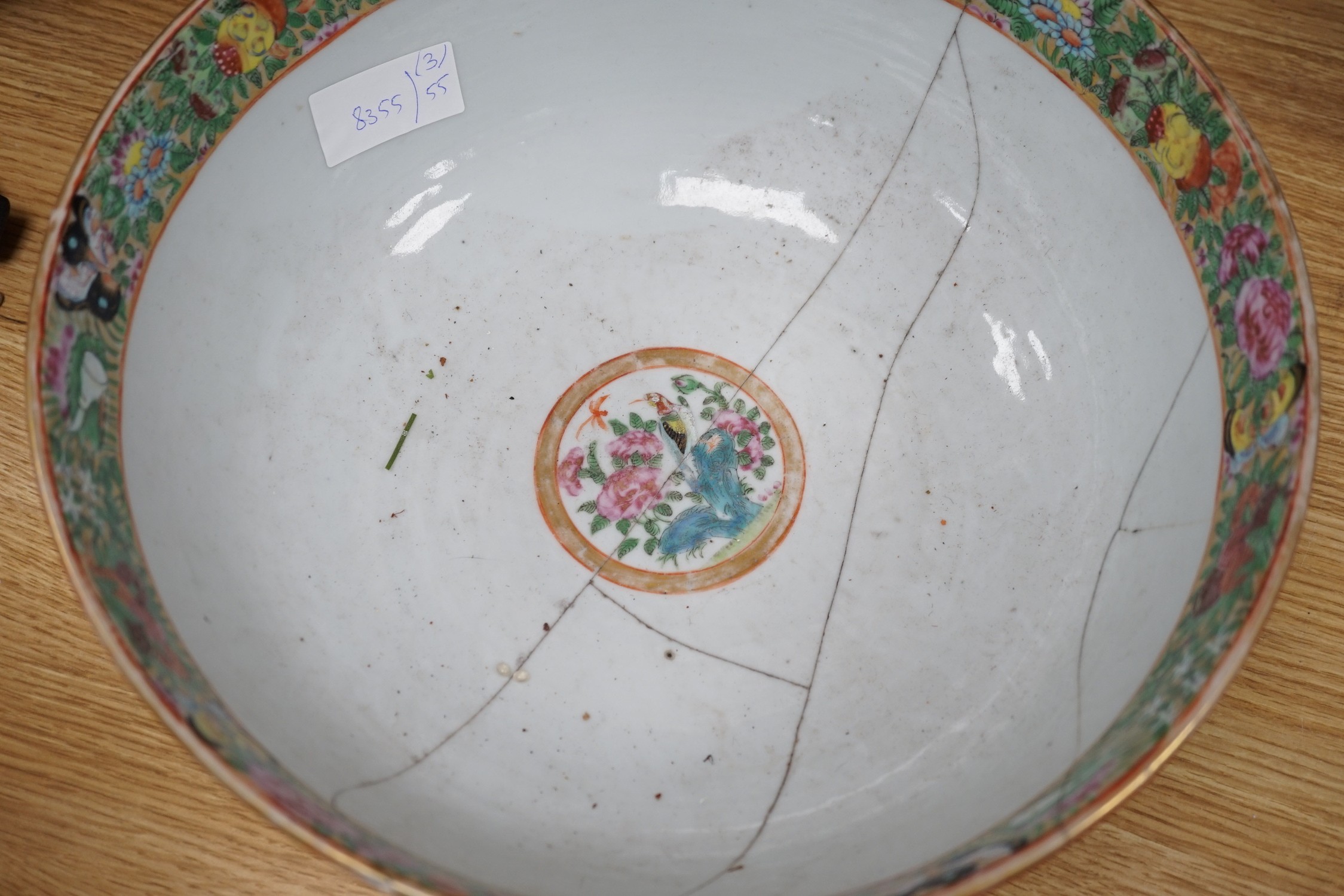 A 19th century Imari bowl, a famille rose bowl and one other- all damaged